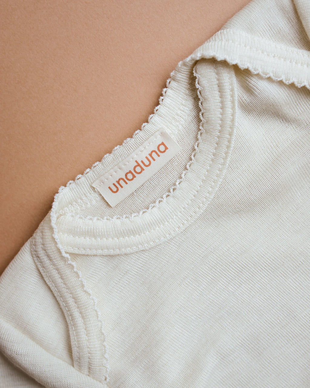 unaduna-body-crochet-edge-longsleeves-natural-baby